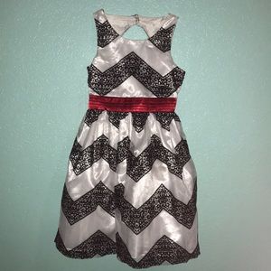 Puffy black, white, and red dress.